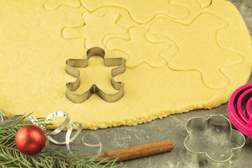 Molds and gingerbread dough for Christmas cookies