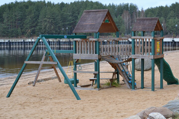 Children's playground in the park on the beach. Koprino Bay, Rybinsk, Russia. October 01, 2020.