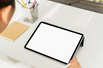 Woman hand holding digital tablet and the screen is blank. copy space for your advertising.