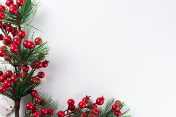 Christmas new year composition on white background. Fir branches, christmas decoration. Flat lay, top view, copy space