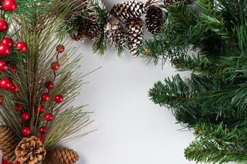 Christmas new year composition on white background. Fir branches, christmas decoration. Flat lay, top view, copy space