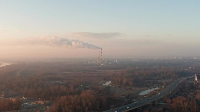 Drone footage of heat and power plant in Warsaw, Poland. EC Siekierki seen autumn during sunrise.