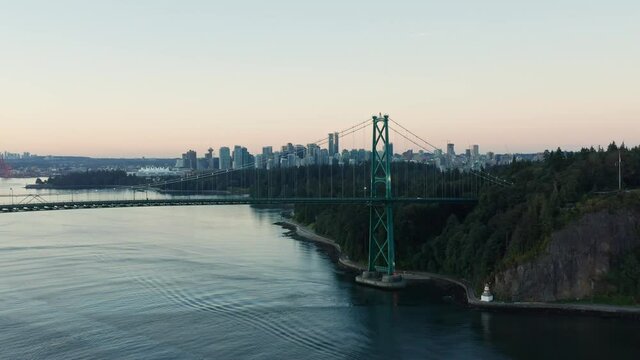 Stunning Drone Aerial Shot flying towards Lions Gate Bridge and Vancouver City, Canda.