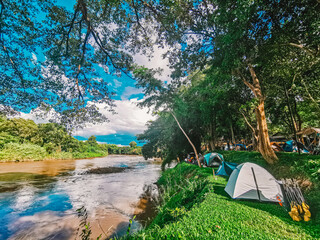the nature camping zone near River Kwai with nature and blue sky view at Kanchanaburi, Thailand