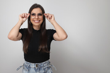 beautiful girl on white and gray background.