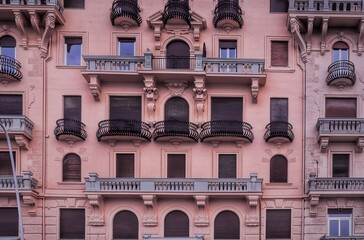 Facade and windows of houses in Naples, Italy.