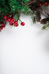Christmas new year composition on white background. Fir branches, christmas decoration. Flat lay, top view, copy space