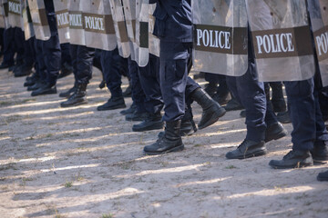 Fototapeta premium Riot police practice shields and baton 