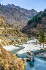 Beautiful winter landscape of Parvati valley with snow covered trees in Himachal Pradesh, India