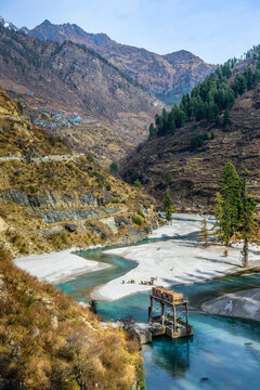 Beautiful winter landscape of Parvati valley with snow covered trees in Himachal Pradesh, India
