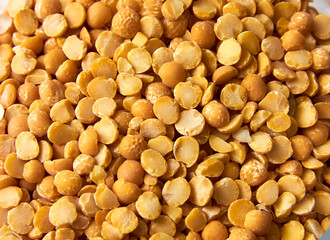 raw split pea seeds for the background. healthy food. vegetarian food