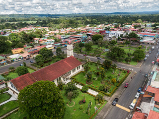 Beautiful aerial view of church in the town of the Fortuna with majestic Arenal Volcano in Costa Rica