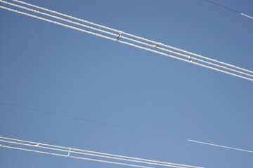 frost on high-voltage wires