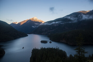 Beautiful landscape view of the sunrise shining on the mountains at Diablo Lake Overlook of North Cascades National Park in Washington state.