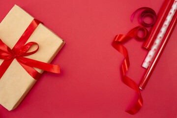 Gift wrapping. Red background, copy space