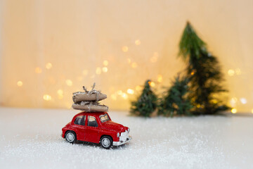 toy retro car with christmas gifts