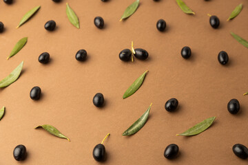 black olives background brown background