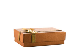 closed rectangular golden gift box for jewelry isolated on white background. Wedding, romantic concept.