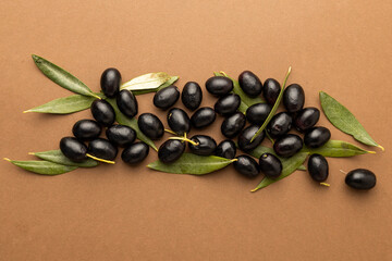 black olives background brown background