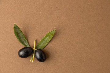 black olives background brown background