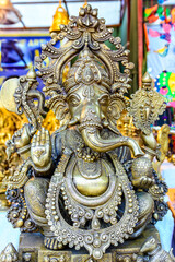 Traditional colorful god statues & souvenir shop at Dilli Haat, New Delhi. Dilli Haat is a craft market located run by Delhi Tourism and Transportation Corporation