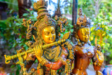 Traditional colorful god statues & souvenir shop at Dilli Haat, New Delhi. Dilli Haat is a craft market located run by Delhi Tourism and Transportation Corporation
