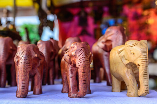 Traditional colorful god statues & souvenir shop at Dilli Haat, New Delhi. Dilli Haat is a craft market located run by Delhi Tourism and Transportation Corporation