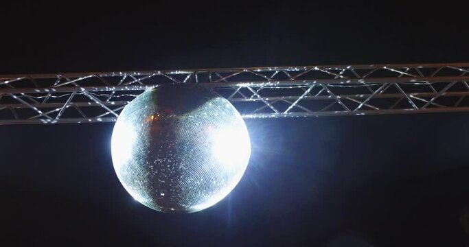 From down shot disco balls, which is illuminated in the dark.
