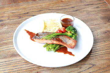 Grilled salmon with fresh vegetable salad