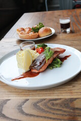 Grilled salmon with fresh vegetable salad