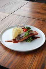 Grilled salmon with fresh vegetable salad