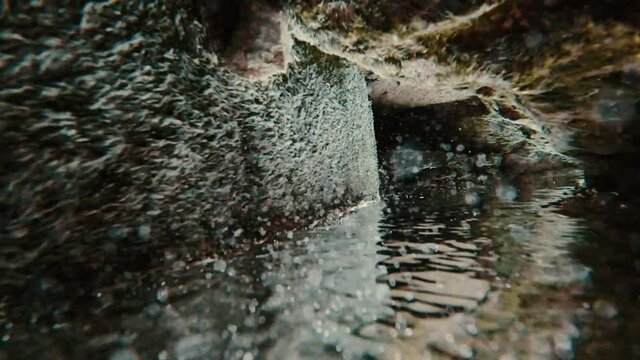 Shooting underwater. Mountain creek. Inverted&nbsp;frame.