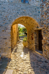 View of traditional architecture and yellow stone's arch  from  the medieval  castle of Monemvasia, Lakonia, Peloponnese.