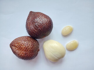 Salak or snake fruit isolated on white background