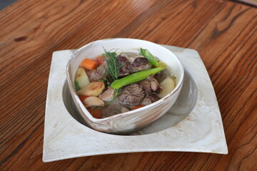 Beef Rib Soup or Sop Iga with Tomato, Carrots, and Potato.