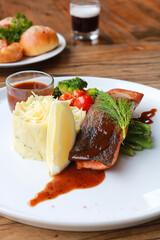 Grilled salmon with fresh vegetable salad