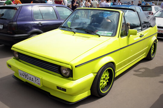 Moscow. Russia - May 20, 2019: Tuned Classic Golf mk 1 convertible in lime color parked on the street.