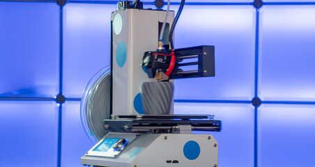 3D printer at work with printer 3D model