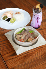 Beef Rib Soup or Sop Iga with Tomato, Carrots, and Potato.
