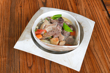 Beef Rib Soup or Sop Iga with Tomato, Carrots, and Potato.