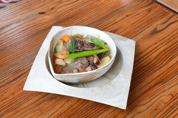 Beef Rib Soup or Sop Iga with Tomato, Carrots, and Potato.