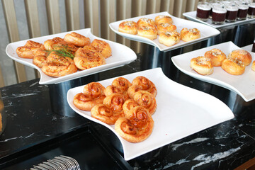 Fresh homemade bread on white plate.