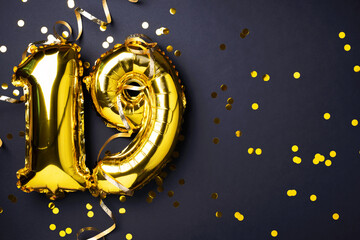 Gold foil balloon number, digit nineteen. Birthday greeting card, inscription 19. Anniversary...