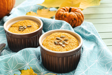 Tasty pumpkin pudding on table