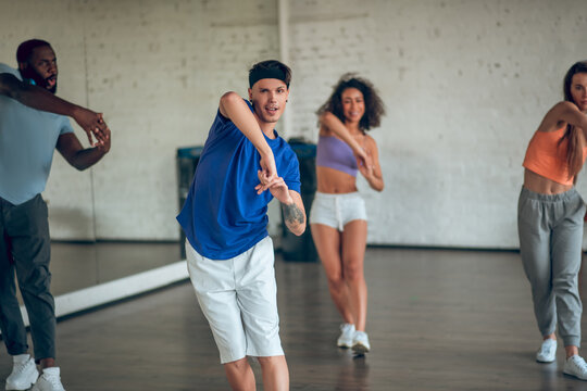 Teacher Showing New Dance Routine To His Students