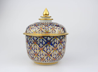 Thai traditional porcelain with lid called Benjarong - It contained of 5 colors art painted in the ceramic , high class art of Thailand isolated on white background
