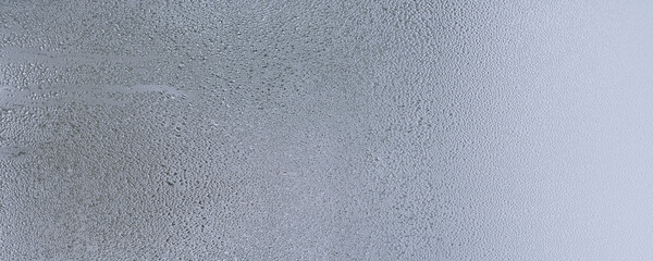 Natural water drops on glass, winter condensation, water drops background, raindrop condensation texture