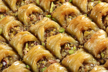 Traditional Dessert Turkish Baklava. Walnut, Pistachio Turkish Style Antep Baklava Presentation. Baklava from Turkish cuisine.