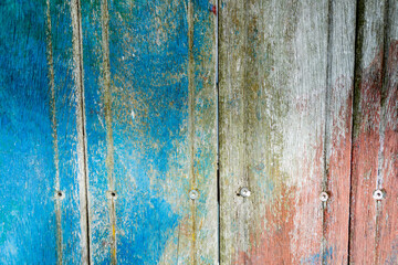 Wooden surface covered with splattered paint.