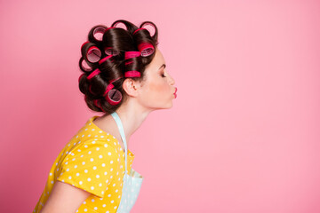 Profile side photo of coquette girl send air kiss copyspace wear yellow dotted t-shirt isolated on...